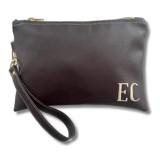 Pochette personalizzata con iniziali in similpelle testa di moro con polsiera e ric. sabbia mod. uomo